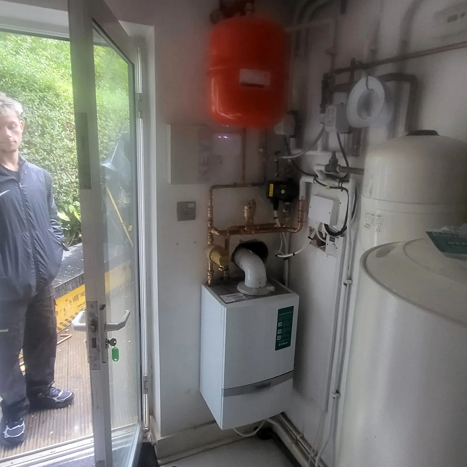 Finished boiler and hot water cylinder installation