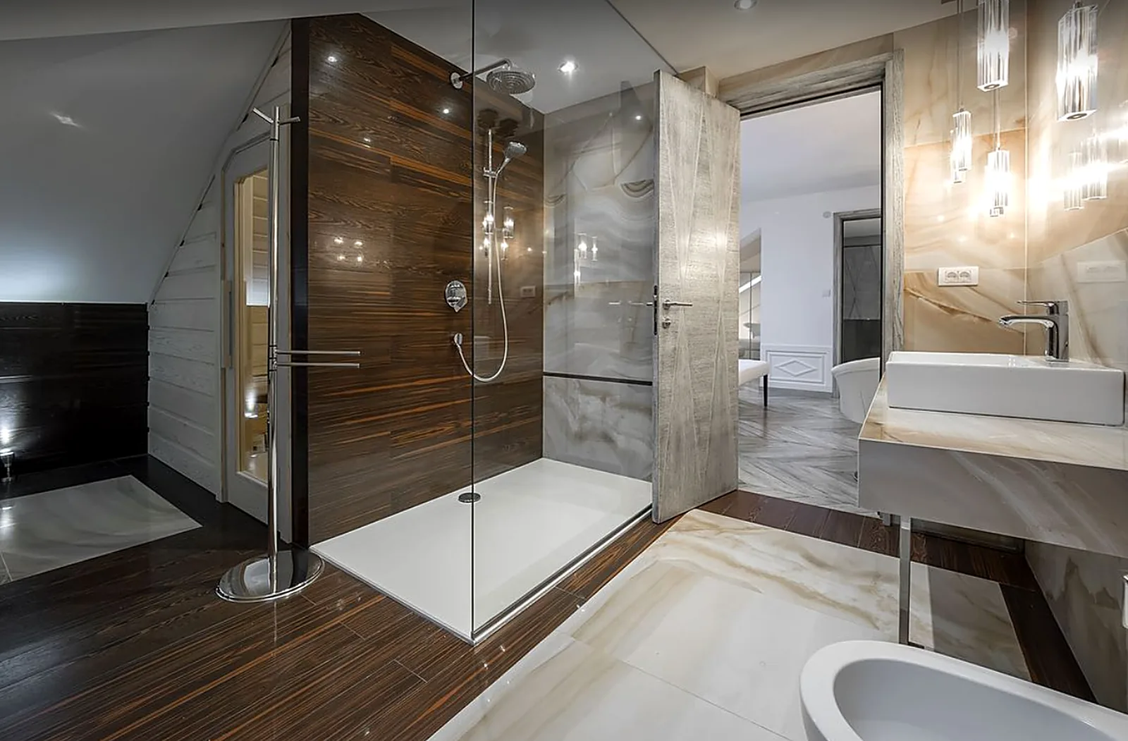 Walk-in shower with glass screen, rainfall shower head and wall-hung basin