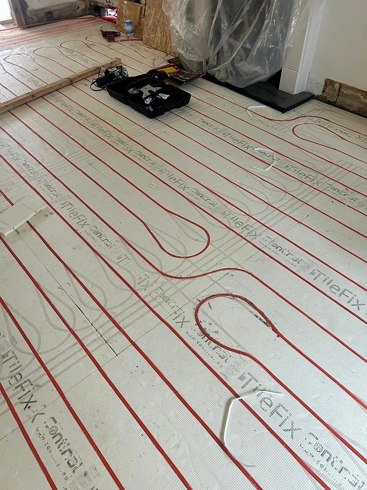 Plumbing pipework being laid by J&L Plumbing and Heating in Pinner